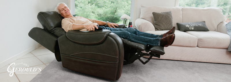 Man in lift chair reclined back in his home