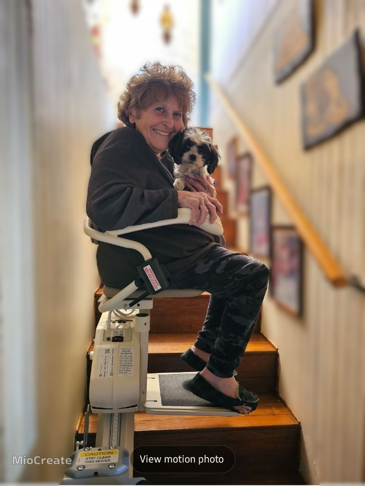 lady on stair lift